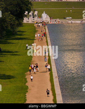 WASHINGTON DC USA Tourists at the Reflecting Pool on National Mall Stock Photo