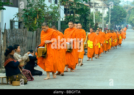 Buddhistic monks going on almsround, Laos, Luang Prabang Stock Photo