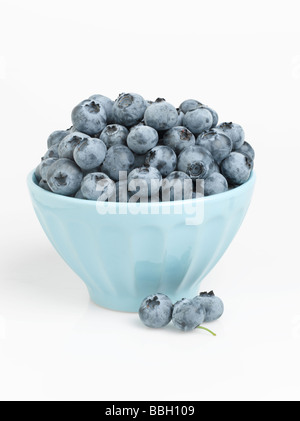 Bowl of blueberries isolated on white background Stock Photo