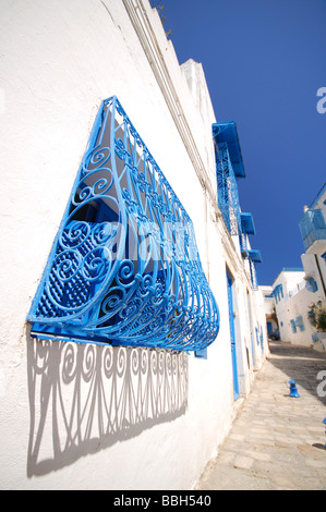 TUNIS, TUNISIA. Ornate window grille on a house in the village of Sidi bou Said outside Tunis. 2009. Stock Photo