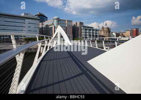 Footbridge known as the Squiggly bridge across river Clyde from the Broomielaw to Tradeston Glasgow Scotland