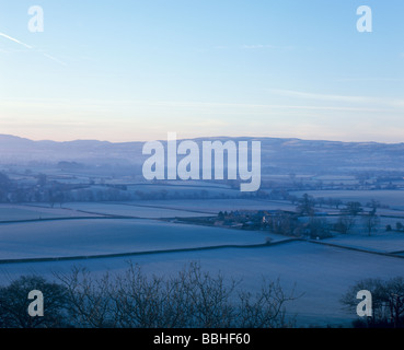 View of Long Mynd from Lyth Hill on a frosty winter morning Stock Photo