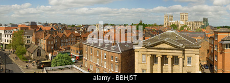 Panoramic city centre view across rooftops with York Minster in the background North Yorkshire England UK United Kingdom GB Great Britain Stock Photo