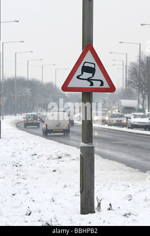 a slippery road sign in snow wolverhampton new road dudley Stock Photo