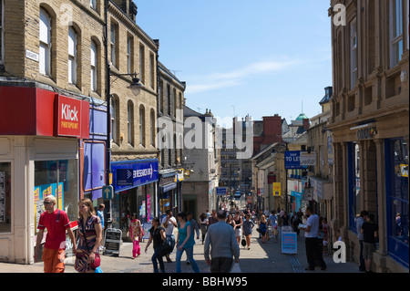 Shops on Ivegate in the City Centre, Bradford, West Yorkshire, England Stock Photo