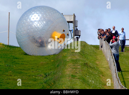 Zorb, zorbing, sphereing, Dorset, Britain, UK Stock Photo