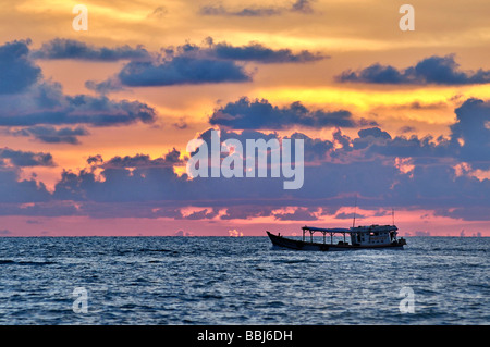 Fishing boat at atmospheric sunset, sea, Phu Quoc, Vietnam, Asia Stock Photo