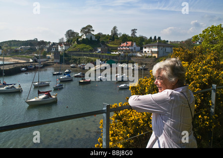 dh Aberdour yacht harbour ABERDOUR FIFE Woman looking over older uk generation senior adult Stock Photo
