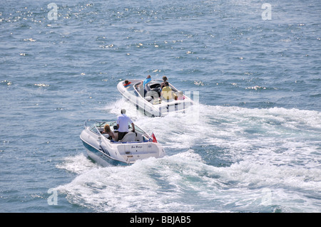 Two pleasure boats in Poole harbour Dorset England Stock Photo