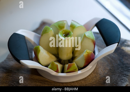 apple corer in action Stock Photo