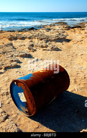 OIL DRUM ON A BEACH Stock Photo