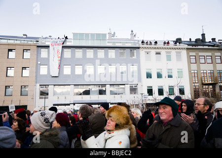 Demonstrators in front of Althingi, Icelandic parliament, at Austurvöllur.  Downtown Reykjavík Iceland Stock Photo