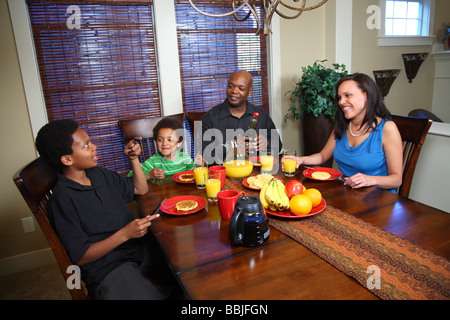 Family having breakfast together Stock Photo