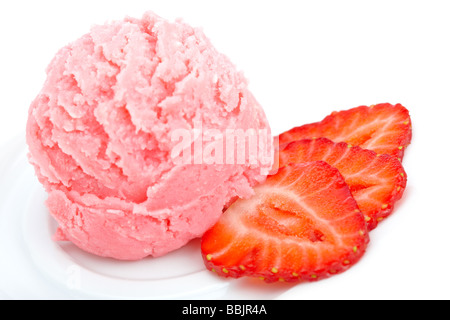 Delicious strawberry ice cream in white dish Shallow depth of field Stock Photo