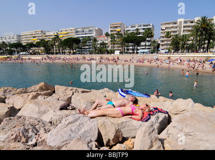 The main beach on the Croisette, in the centre of Cannes, French riviera, during the famous film festival. Southern France. Stock Photo