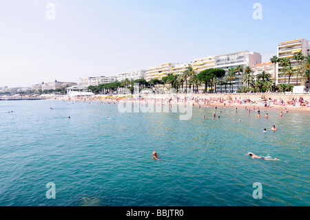 The main beach on the Croisette, in the centre of Cannes, French riviera, during the famous film festival. Southern France. Stock Photo