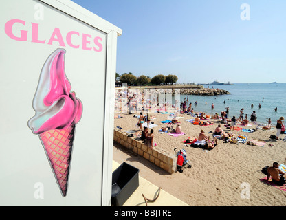 The main beach on the Croisette, in the centre of Cannes, French riviera, during the famous film festival. Southern France. Stock Photo