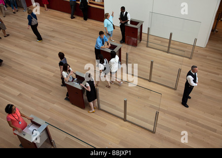 CHICAGO Illinois Visitors passing cashier stations in Griffin Court lobby of Modern Wing addition to Art Institute museum Stock Photo