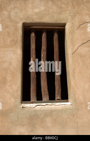 Adobe Building Windows Detail of adobe building windows with wooden vigas above in Santa Fe ...