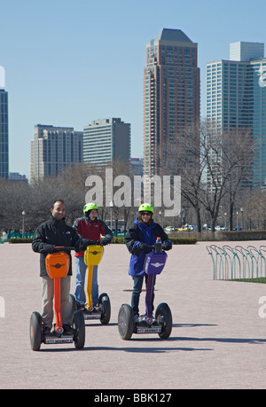 Chicago Illinois People ride Segway personal transporters in Grant Park Stock Photo