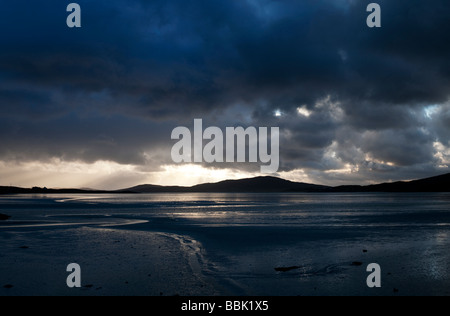 Sunset and storm clouds over Isle of Harris, Luskentyre beach, Outer Hebrides, Scotland Stock Photo