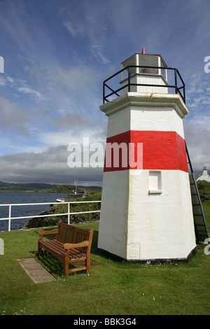 Crinan Canal, Scotland. Lighthouse at the sea lock basin entrance to Crinan Harbour at Loch Crinan on the Sound of Jura. Stock Photo
