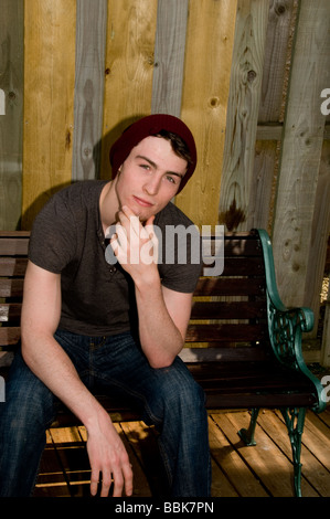 Handsome serene young man in deep thought. Stock Photo