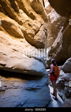 A hiker in slot canyon in Anza Borrego Desert State Park California model released Stock Photo