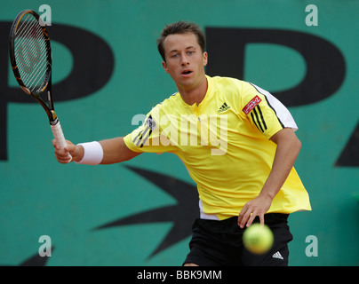 German player Philipp Kohlschreiber plays forehand return at Roland Garros