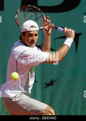 German player Tommy Haas (GER ) plays a backhand return at Roland Garros Stock Photo