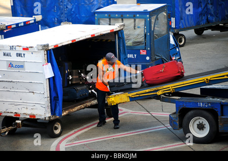 Airport baggage handler, Logan Airport, Boston, USA Stock Photo