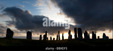 Callanish standing stones, Isle of Lewis, Outer Hebrides, Scotland Stormy sunset silhouette panoramic Stock Photo