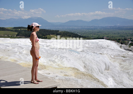 Pamukkale Turkey Tourist young woman in swimsuit background