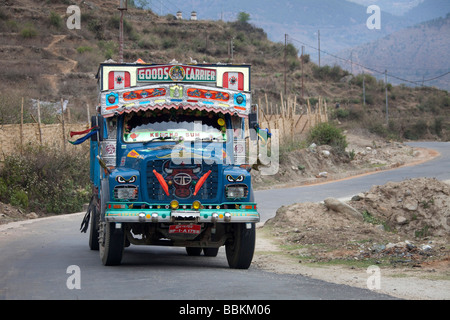 Colourful lorry transporting goods. Tata Bhutan Asia. Decorated in bright colours. Horizontal 92220 Bhutan Stock Photo