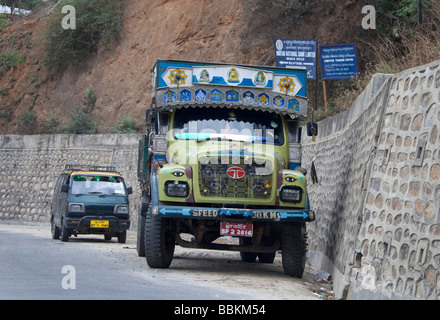 Colourful lorry transporting goods. Tata Bhutan Asia. Decorated in bright colours. Horizontal 92215 Bhutan Stock Photo