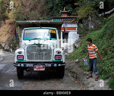 Colourful lorry transporting goods. Tata Bhutan Asia. Decorated in bright colours. Horizontal 91562 Bhutan Stock Photo