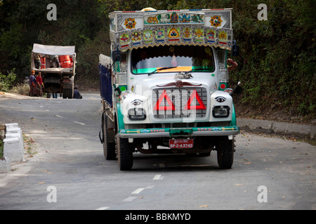 Colourful lorry transporting goods. Tata Bhutan Asia. Decorated in bright colours. Horizontal 91550 Bhutan Stock Photo