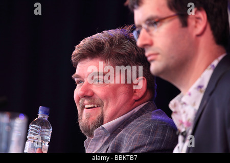 Comedian Andre Vincent on stage with Marcus Brigstocke at the Hay Festival performing The Early Edition comedy show Stock Photo