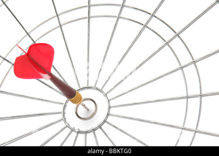 Red dart in white dart board Stock Photo