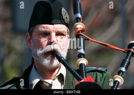 St. Andrew's Legion pipes and drums band playing at Irish Folk Festival in Richmond, Virginia Stock Photo