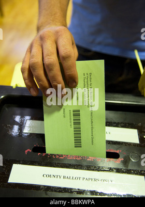 Man voting in local council elections, June 2009, Bordon, Hampshire, UK. Stock Photo