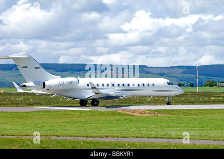 Bombardier BD-700-1A10 Global Express departing Inverness-dalcross Airport.  SCO 2509 Stock Photo