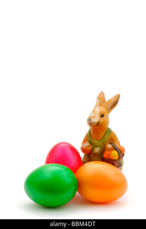 Coloured Easter eggs and a porcelain Easter bunny, Easter Stock Photo