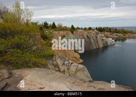 Babson Farm granite quarry in Halibut Point State Park in late spring Stock Photo