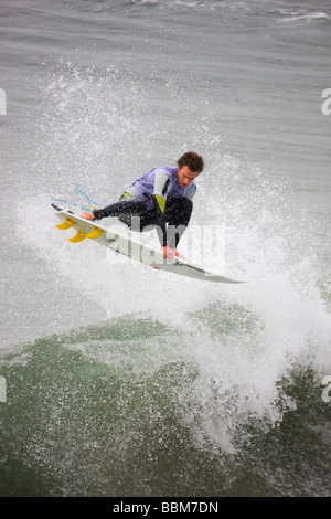 Brett Simpson competing in the Katin Pro Am surf competition at Huntington Beach Pier Orange County California Stock Photo