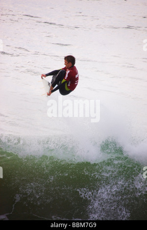 Brett Simpson competing in the Katin Pro Am surf competition at Huntington Beach Pier Orange County California Stock Photo