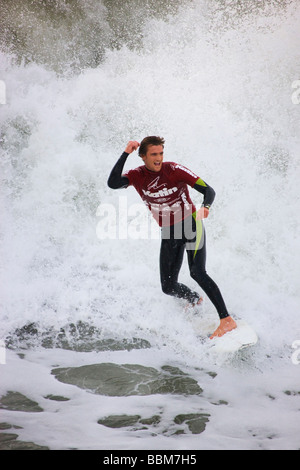 Brett Simpson competing in the Katin Pro Am surf competition at Huntington Beach Pier Orange County California Stock Photo