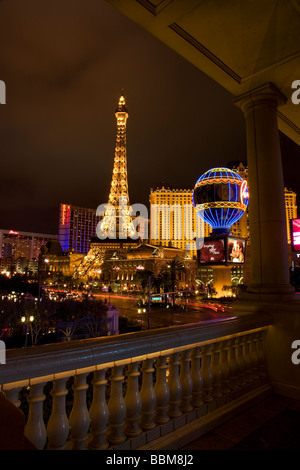 Looking towards the Paris Hotel and Casino on the Strip at night Las Vegas Nevada Stock Photo