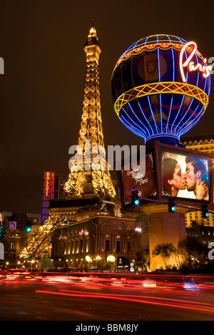 Looking towards the Paris Hotel and Casino on the Strip at night Las Vegas Nevada Stock Photo
