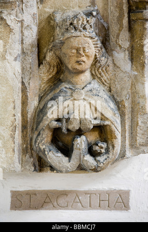 15th Century figure of St. Agatha, St.Lawrence church, Lechlade-on-Thames, Gloucestershire, UK Stock Photo